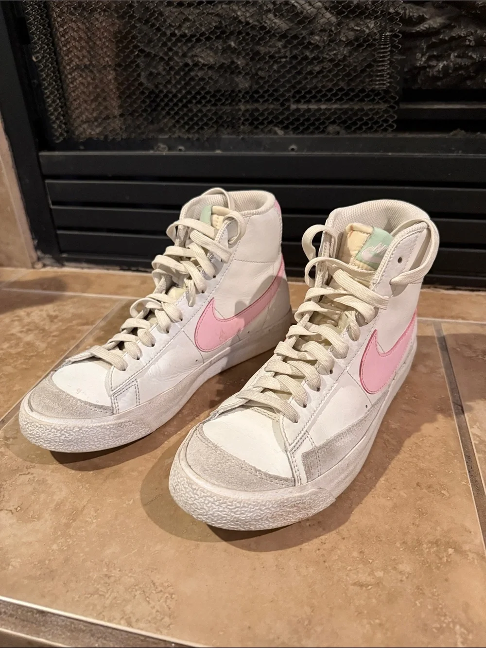Nike Women's High-Top Sneakers in White with Pink Swoosh